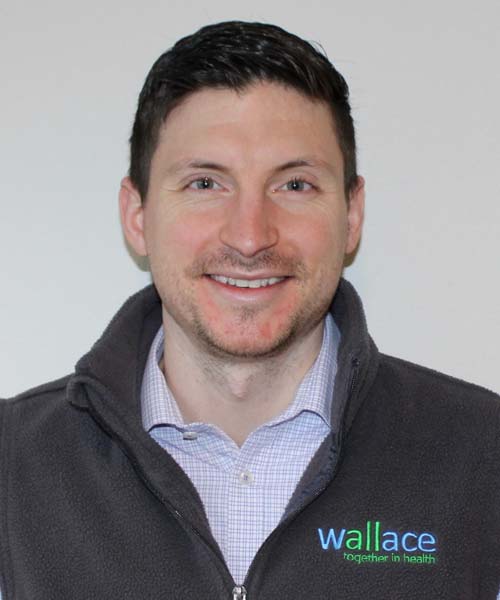 Wallace staff Kyle Geelan, DMD